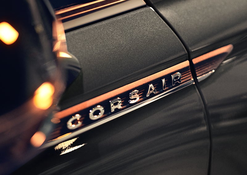 The stylish chrome badge reading “CORSAIR” is shown on the exterior of the vehicle. | Pugmire Lincoln of Marietta in Marietta GA