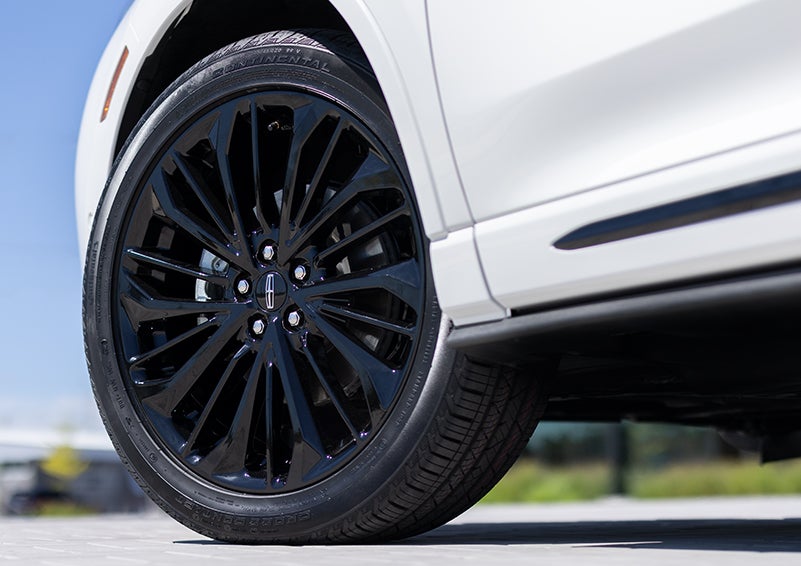 The stylish blacked-out 20-inch wheels from the available Jet Appearance Package are shown. | Pugmire Lincoln of Marietta in Marietta GA