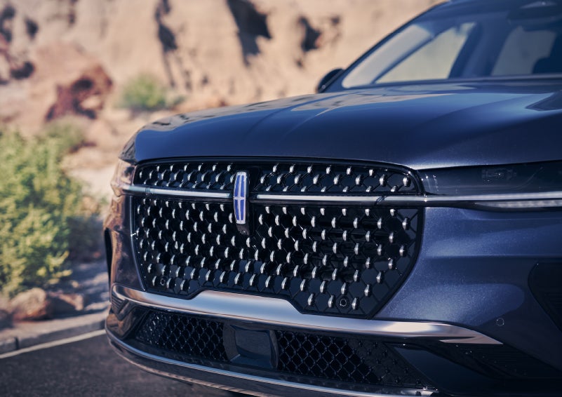 The stylish grille of a 2024 Lincoln Nautilus® SUV sparkles in the sunlight. | Pugmire Lincoln of Marietta in Marietta GA